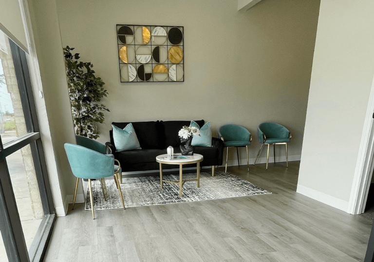 lobby of Ross Dental Studio with a couch and chairs