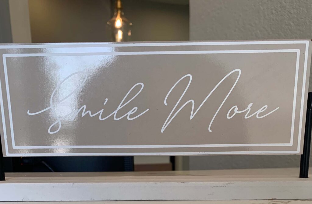 Smile More sign